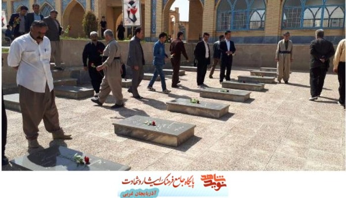 عطرافشاني وگلباران مزارشهداشهرستان بوكان توسط رئيس بنياد شهيدوامورايثارگران و جانبازان 